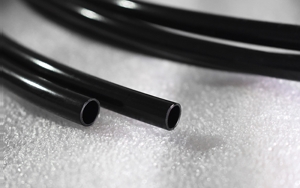 Tubo termoretráctil semirrígido de doble pared resistente a la abrasión