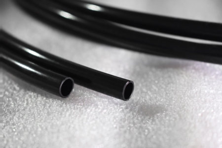 Tubo termoretráctil semirrígido de doble pared resistente a la abrasión